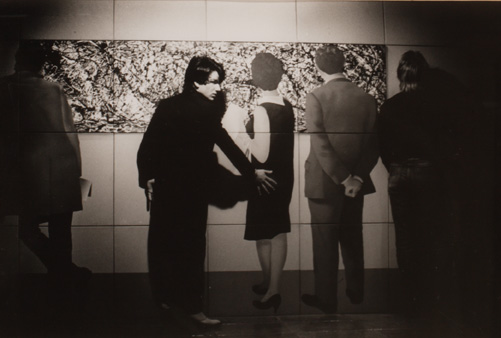 Patrick Brocklebank's 1979 photograph of Bono and Guggi standing in front of Robert Ballagh's 'Three People with Jackson Pollock'