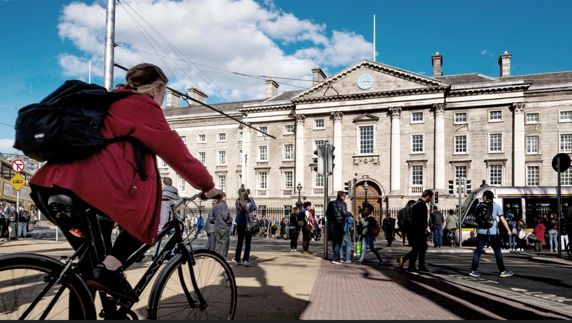 Girl cycling to trinity