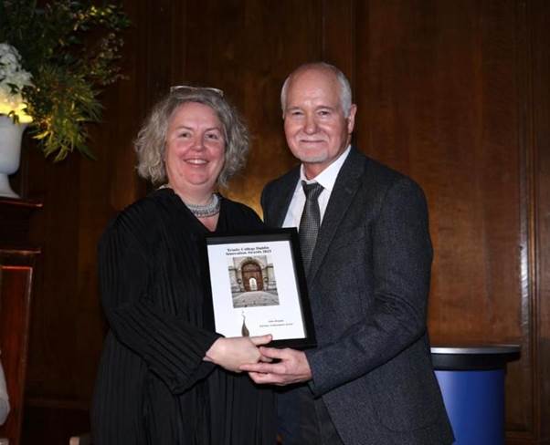 Professor John Boland receives the Lifetime Achievement Award from Dr Linda Doyle