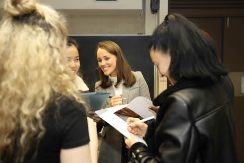 Students smiling in classroom